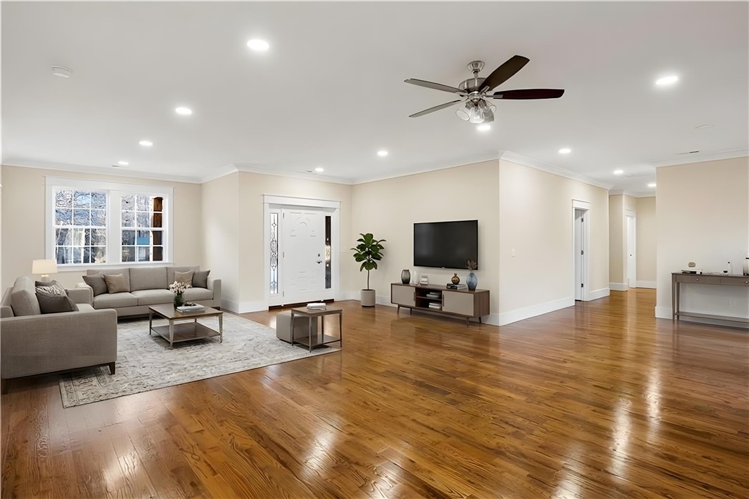 303 Regency Circle Anderson, SC 29625 - Photo 2 of 50 This expansive living space features rich hardwood flooring and abundant natural light.