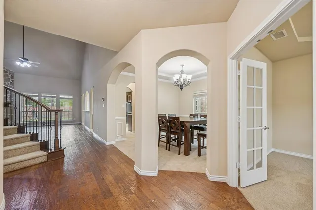 a view of a livingroom with furniture and entryway