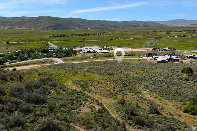 910 Wasatch Drive Kamas, UT 84036 - Photo 13 of 36 Expansive land parcel featuring natural vegetation and distant mountain ranges