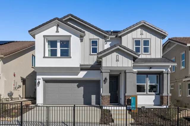 a front view of a house with a porch