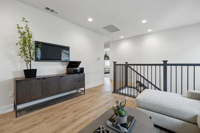 a white bath tub sitting next to a white sink