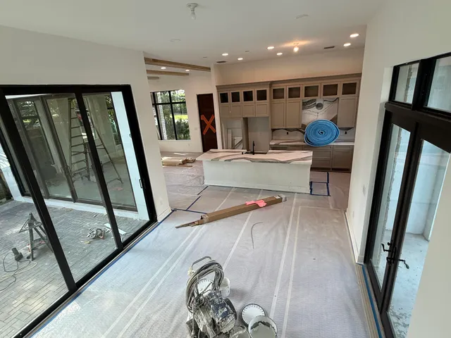 a view of a living room and a balcony