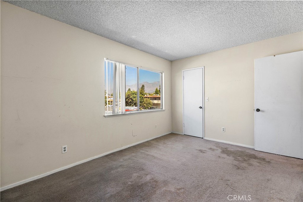 1386 3rd Street Duarte, CA 91010 - Photo 13 of 30 an empty room with windows