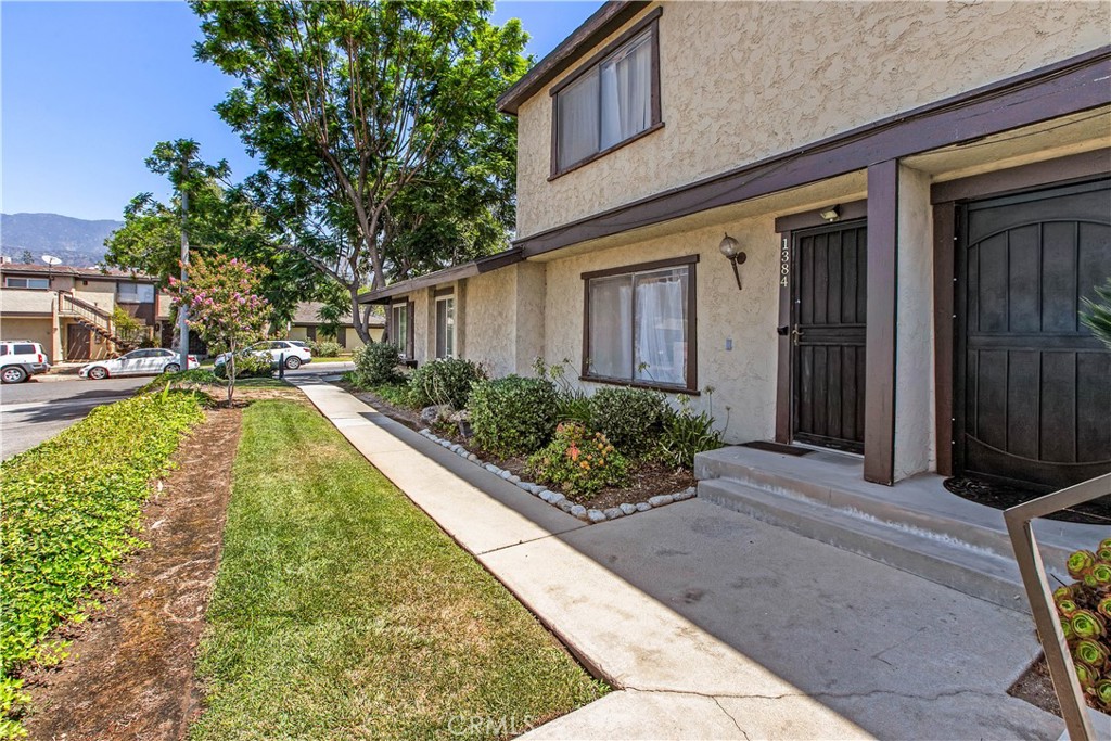 1386 3rd Street Duarte, CA 91010 - Photo 25 of 30 a view of a house with a swimming pool