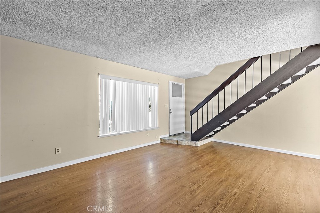 1386 3rd Street Duarte, CA 91010 - Photo 5 of 30 a view of an entryway with wooden floor
