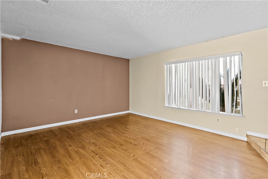 1386 3rd Street Duarte, CA 91010 - Photo 6 of 30 a view of an empty room with a window