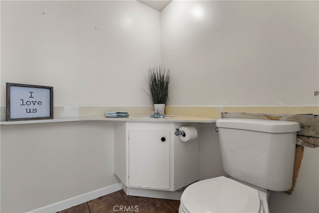 1386 3rd Street Duarte, CA 91010 - Photo 9 of 30 a bathroom with a toilet and a sink