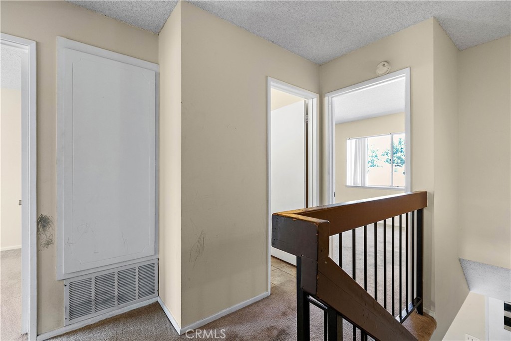 1386 3rd Street Duarte, CA 91010 - Photo 10 of 30 a view of a hallway with wooden floor and windows