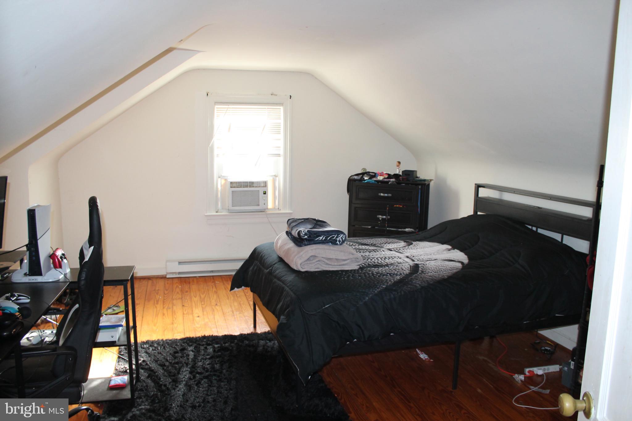 117 West Oates Avenue Winchester, VA 22601 - Photo 15 of 17 a dining room with furniture and wooden floor
