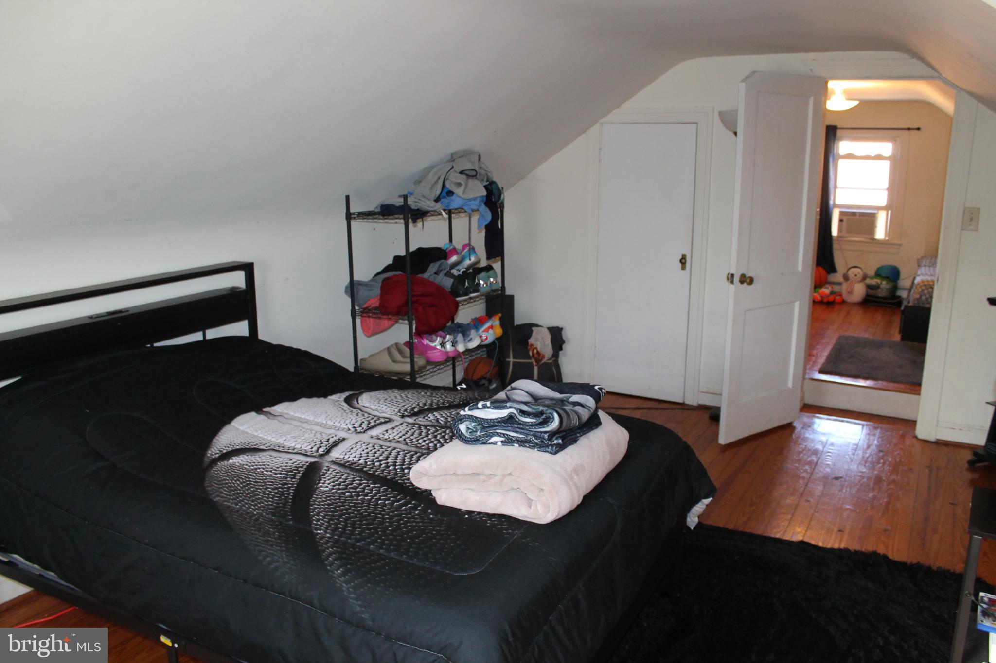 117 West Oates Avenue Winchester, VA 22601 - Photo 16 of 17 a living room with furniture and wooden floor