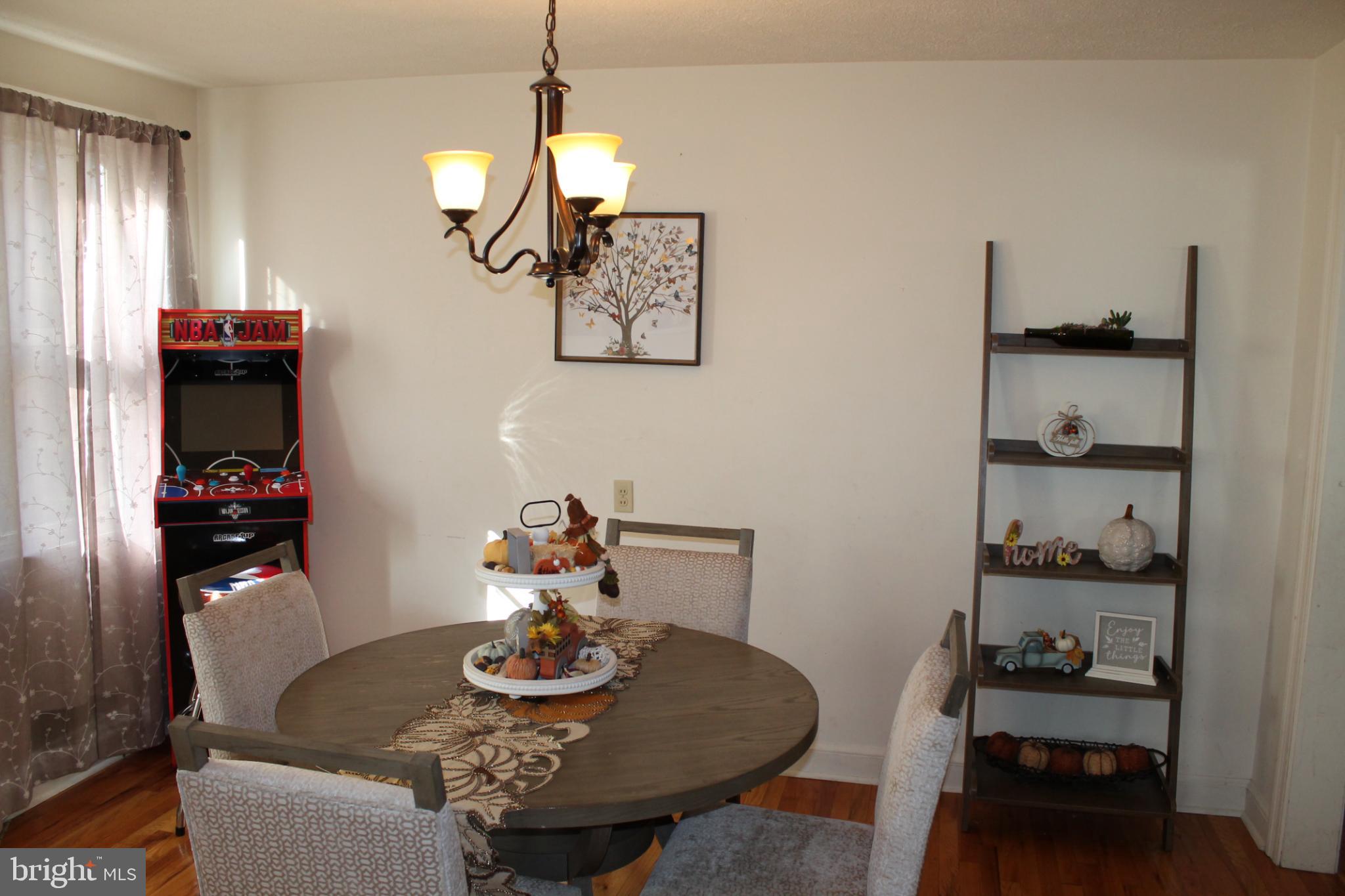 117 West Oates Avenue Winchester, VA 22601 - Photo 6 of 17 a dining room with furniture and wooden floor