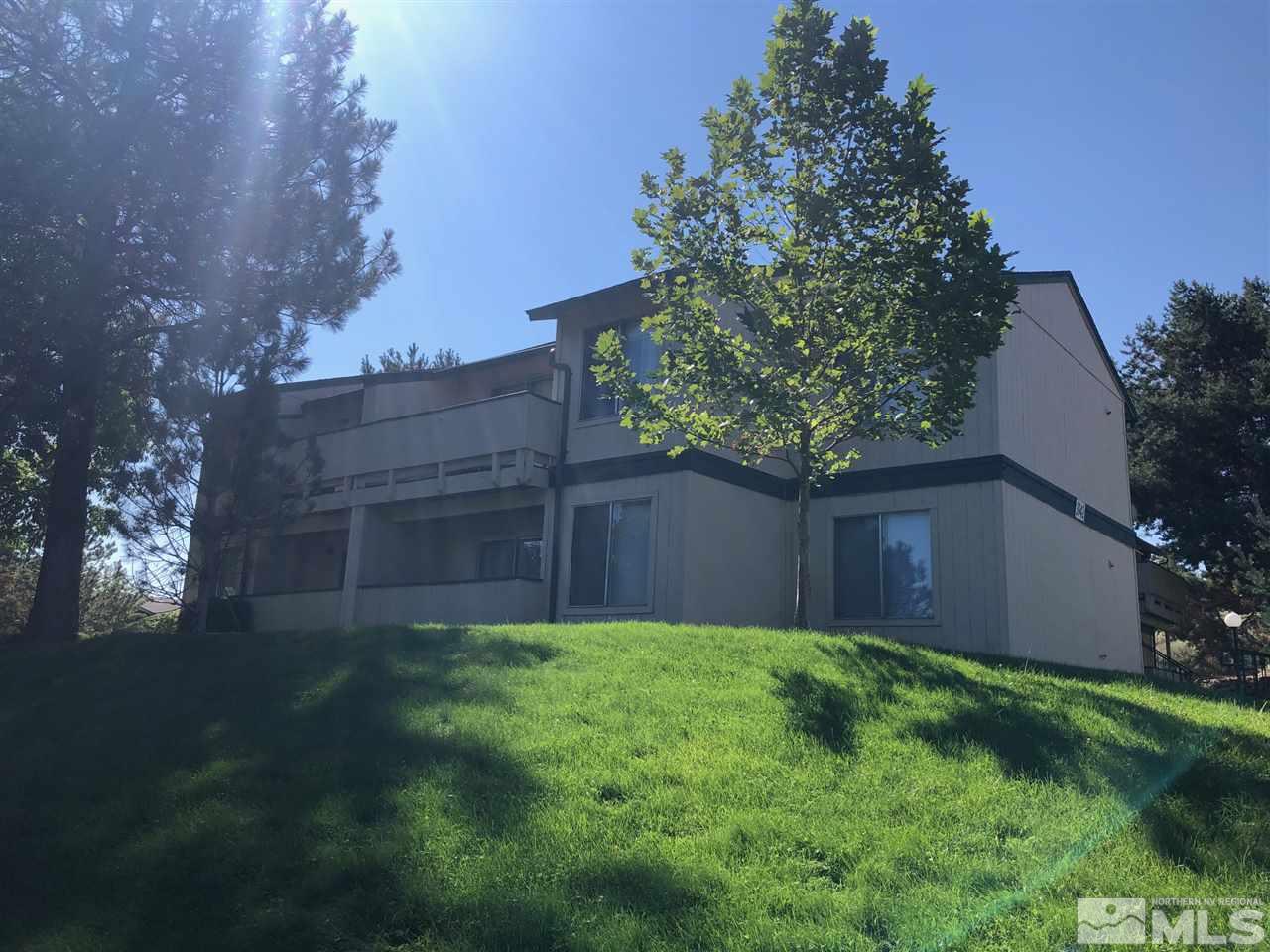 3942 Clear Acre Lane Reno, NV 89512 - Photo 1 of 24 a view of a back yard of the house