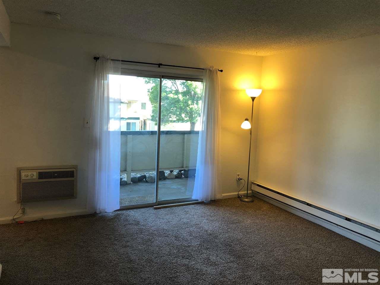 3942 Clear Acre Lane Reno, NV 89512 - Photo 15 of 24 an empty room with windows