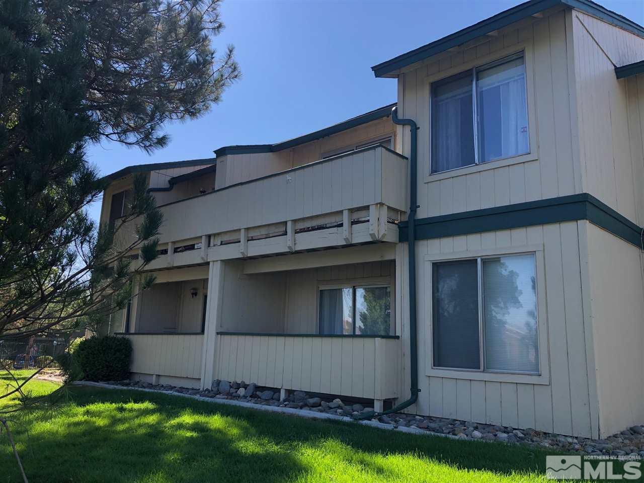 3942 Clear Acre Lane Reno, NV 89512 - Photo 2 of 24 a view of a house with a yard