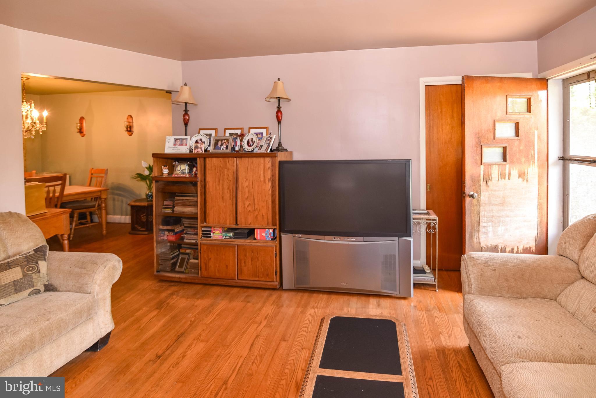 4428 Forge Road Perry Hall, MD 21128 - Photo 3 of 27 a living room with furniture and a flat screen tv