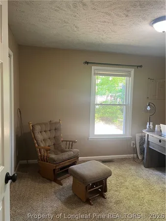 a room with furniture and a window