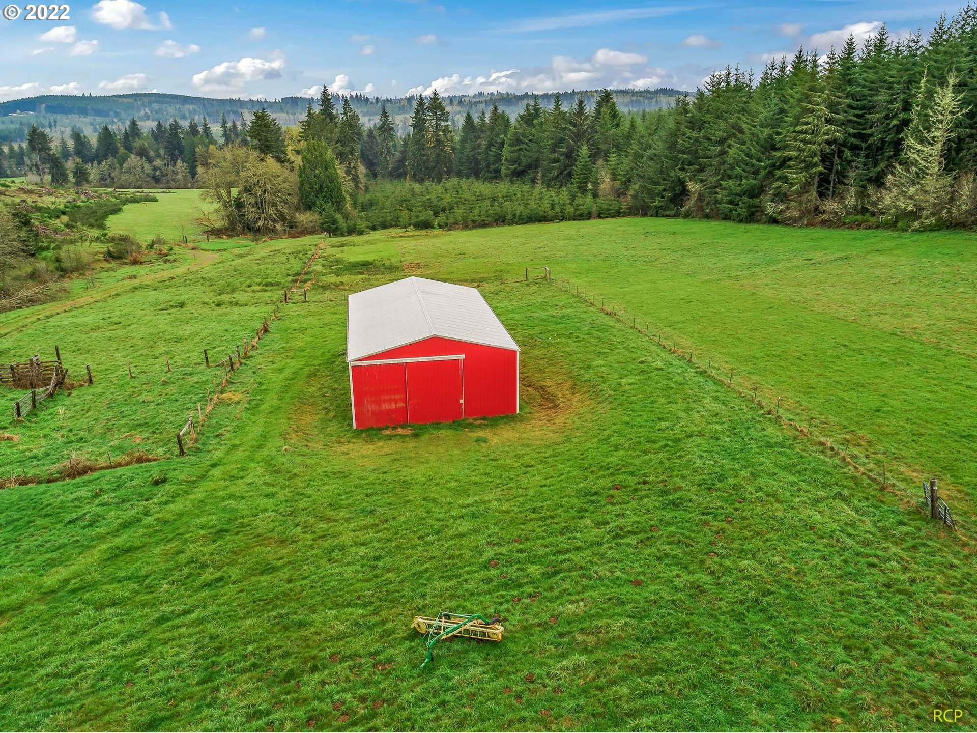 24596 Mosier Road Rainier, OR 97048 - Photo 8 of 32 a view of a big yard with potted plants and large tree