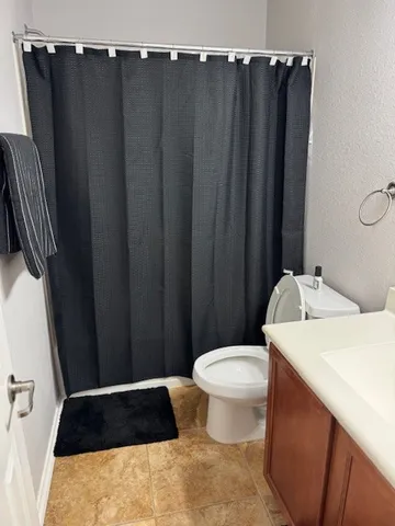 a bathroom with a sink and a toilet