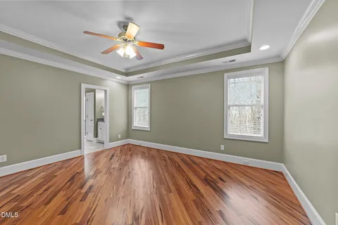 a room with a chair and washer dryer
