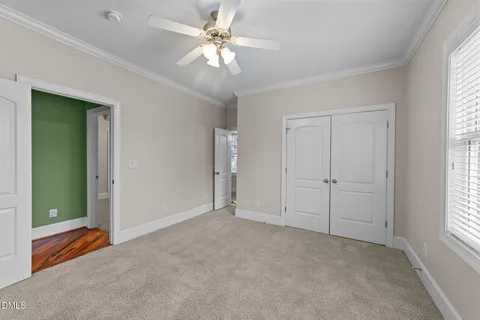 a bathroom with a granite countertop sink mirror and shower
