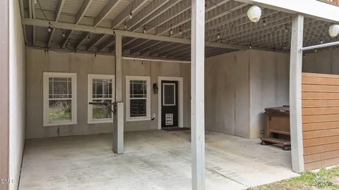 a kitchen with a stove and a refrigerator