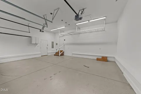 a view of an empty room with windows