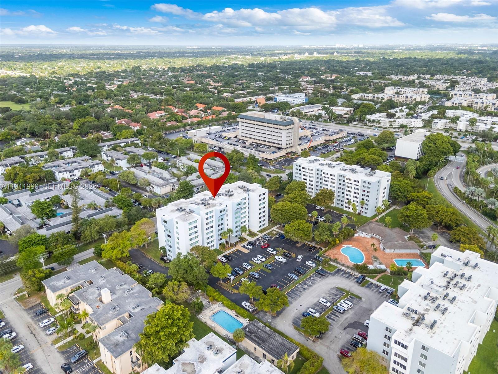 9125 Southwest 77th Avenue, Unit 202 Miami, FL 33156 - Photo 26 of 30 an aerial view of residential houses with outdoor space