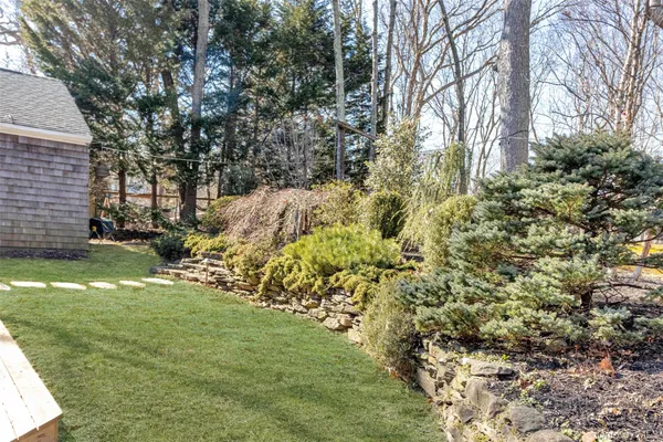 a backyard of a house with lots of green space