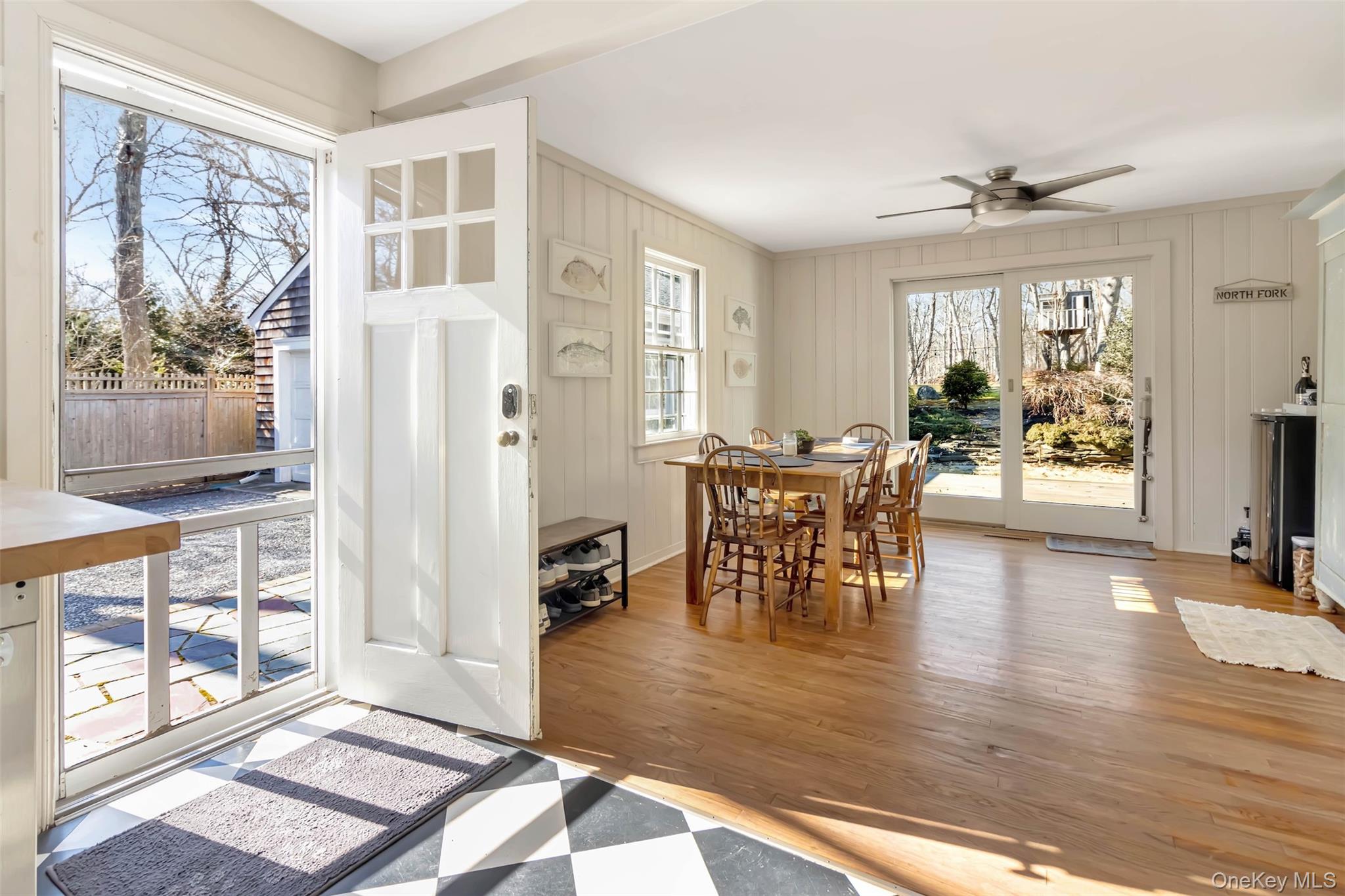 1500 Vanston Road Cutchogue, NY 11935 - Photo 6 of 26 Dining room featuring a ceiling fan and wood finished floors
