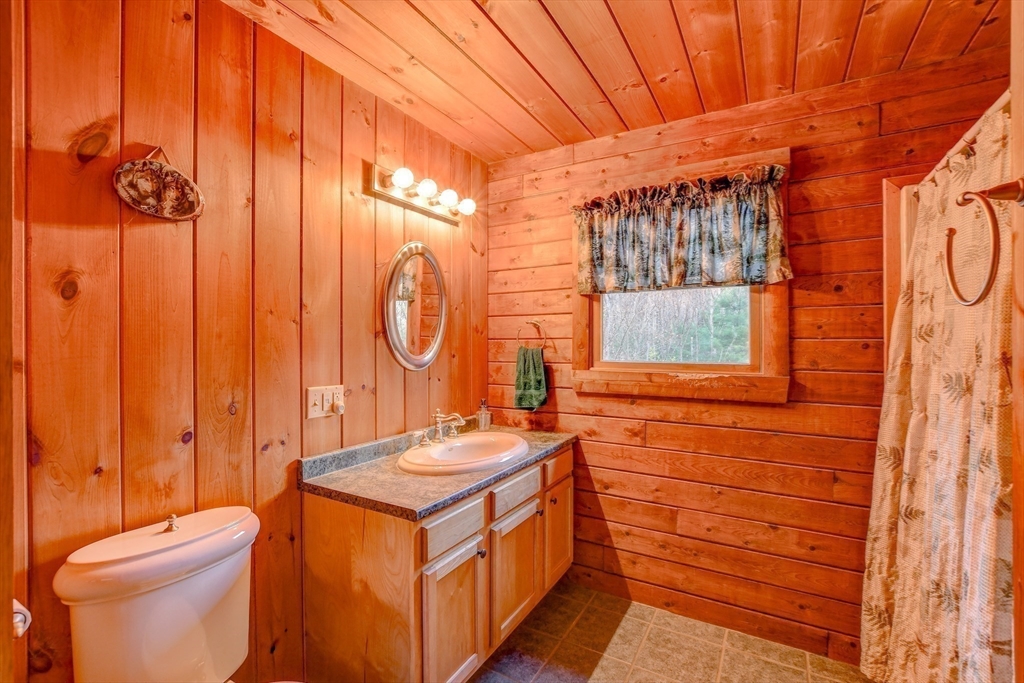 23 Dana Road Petersham, MA 01366 - Photo 11 of 32 a bathroom with a sink a toilet and a shower