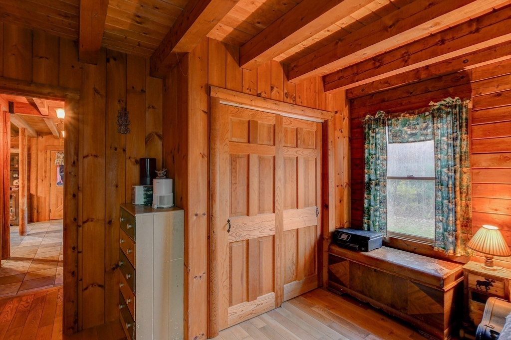 23 Dana Road Petersham, MA 01366 - Photo 13 of 32 a view of front door with lounge chair