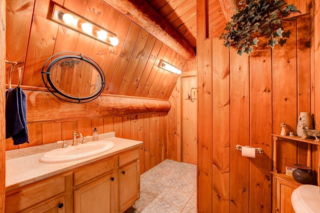 23 Dana Road Petersham, MA 01366 - Photo 18 of 32 a bathroom with a sink and a mirror