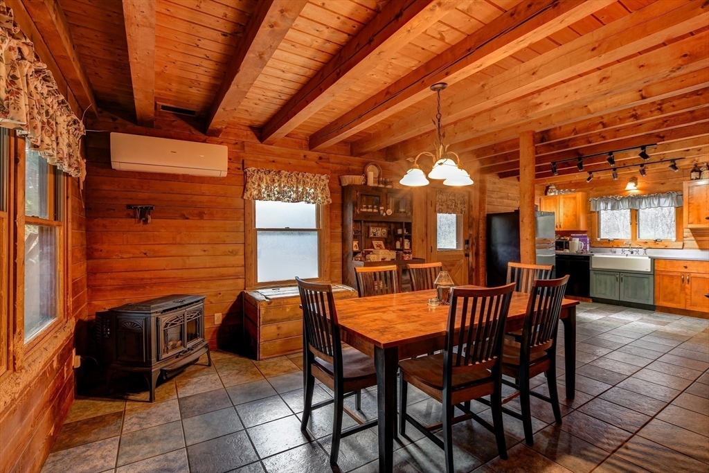 23 Dana Road Petersham, MA 01366 - Photo 5 of 32 a view of a dining room with furniture and chandelier