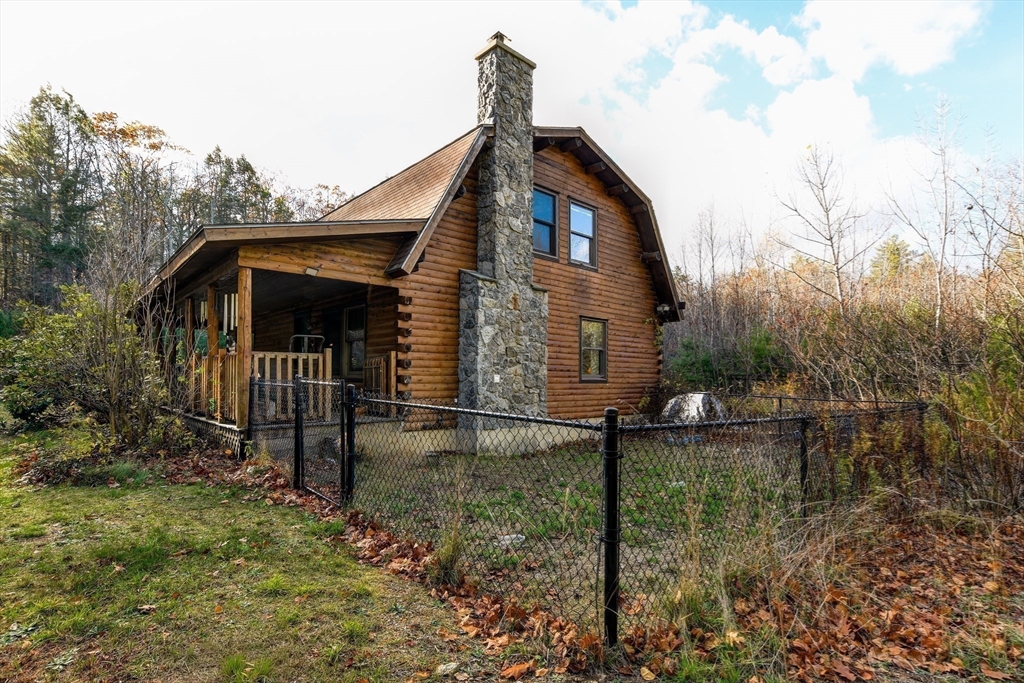 23 Dana Road Petersham, MA 01366 - Photo 10 of 32 a front view of a house with garden