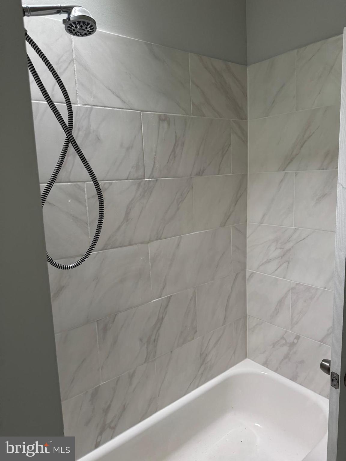 2240 Cedley Street Baltimore, MD 21230 - Photo 6 of 12 a bathroom with a bathtub