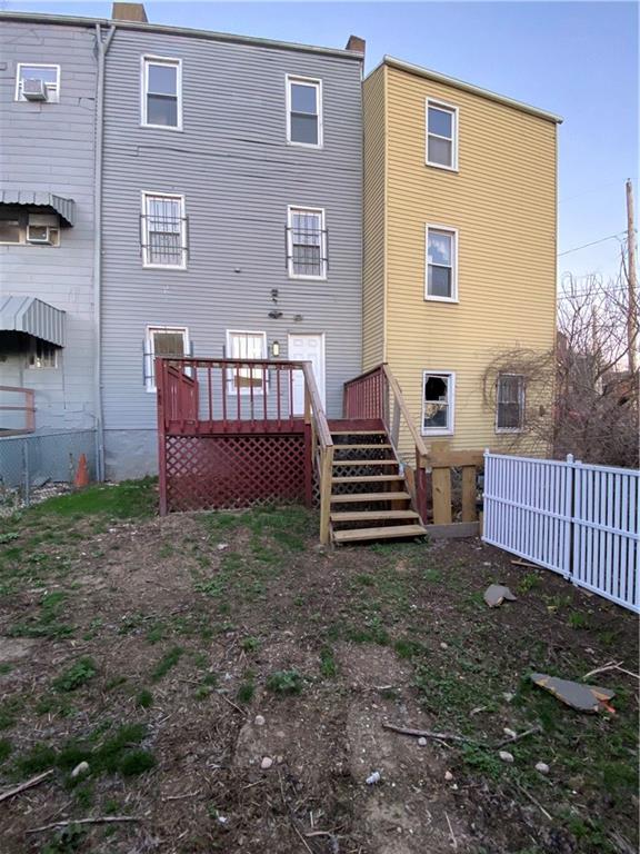 113 Kirkpatrick Street Pittsburgh, PA 15219 - Photo 16 of 29 a view of a house with backyard and deck