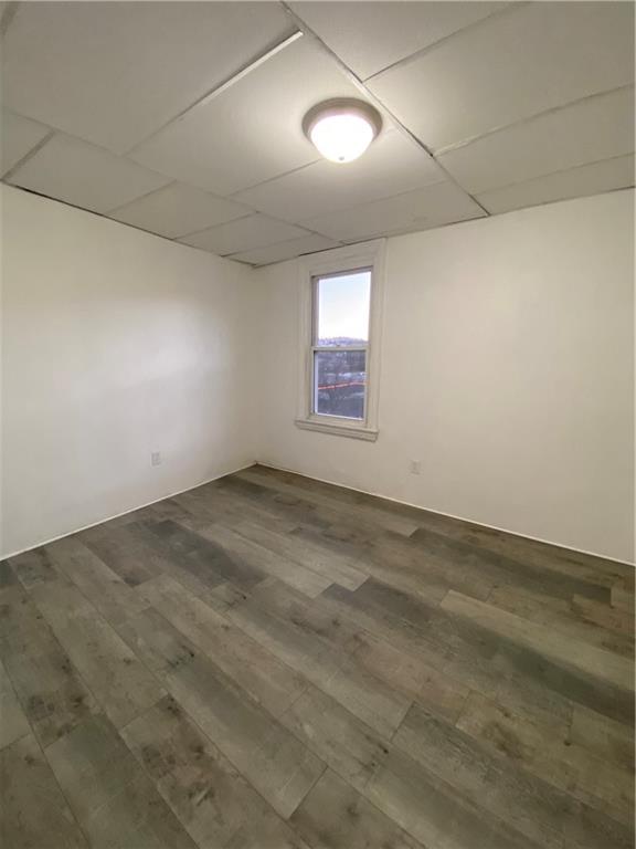 113 Kirkpatrick Street Pittsburgh, PA 15219 - Photo 23 of 29 an empty room with a empty space and windows