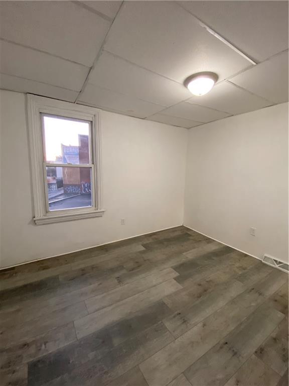 113 Kirkpatrick Street Pittsburgh, PA 15219 - Photo 26 of 29 an empty room with a empty space and windows