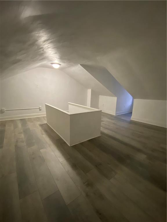 113 Kirkpatrick Street Pittsburgh, PA 15219 - Photo 29 of 29 a view of an empty room with wooden floor