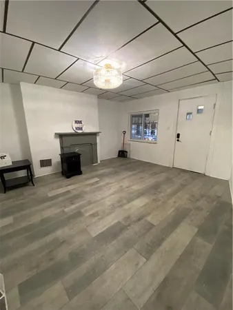 a view of a livingroom with a flat screen tv