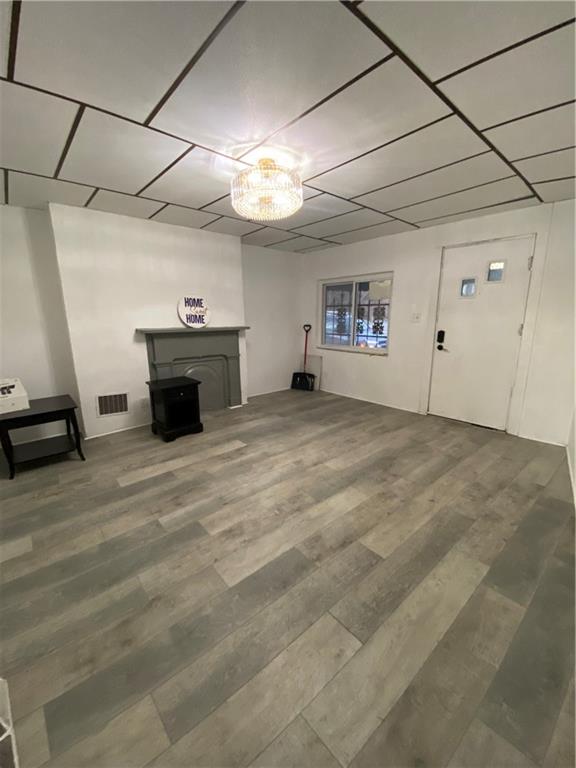 113 Kirkpatrick Street Pittsburgh, PA 15219 - Photo 4 of 29 a view of a livingroom with a flat screen tv