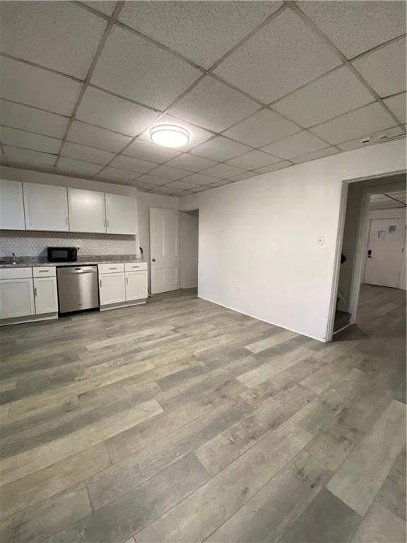 113 Kirkpatrick Street Pittsburgh, PA 15219 - Photo 6 of 29 a view of a kitchen with a sink and a refrigerator