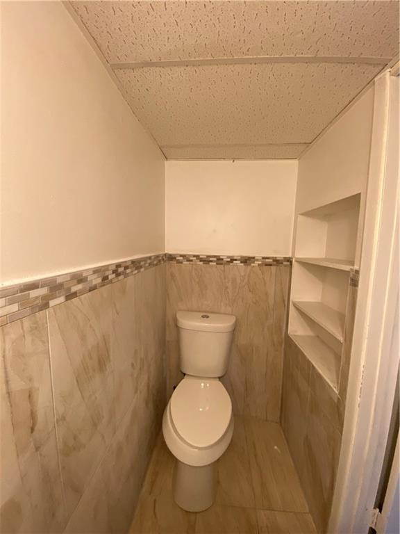 113 Kirkpatrick Street Pittsburgh, PA 15219 - Photo 9 of 29 a bathroom with a toilet