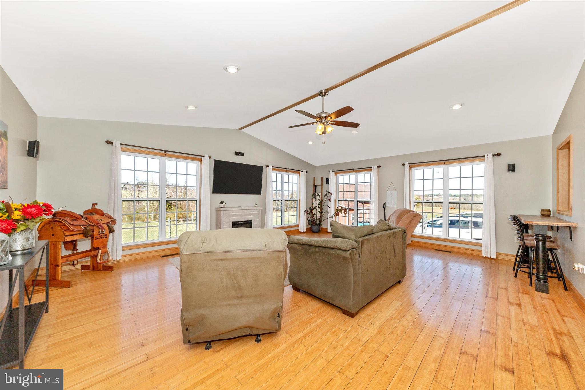 17449 Irishtown Road Emmitsburg, MD 21727 - Photo 11 of 77 a living room with furniture and a flat screen tv