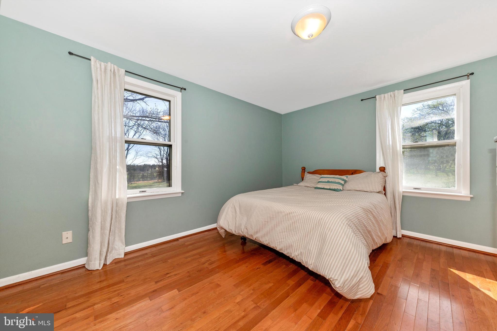 17449 Irishtown Road Emmitsburg, MD 21727 - Photo 23 of 77 a bedroom with a bed and a window