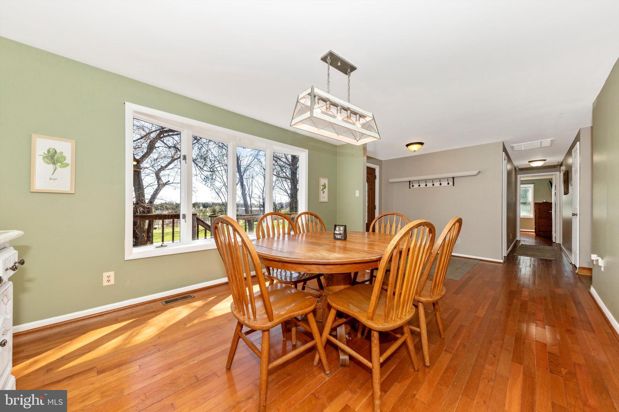 17449 Irishtown Road Emmitsburg, MD 21727 - Photo 4 of 77 a view of a dining room with furniture window and wooden floor