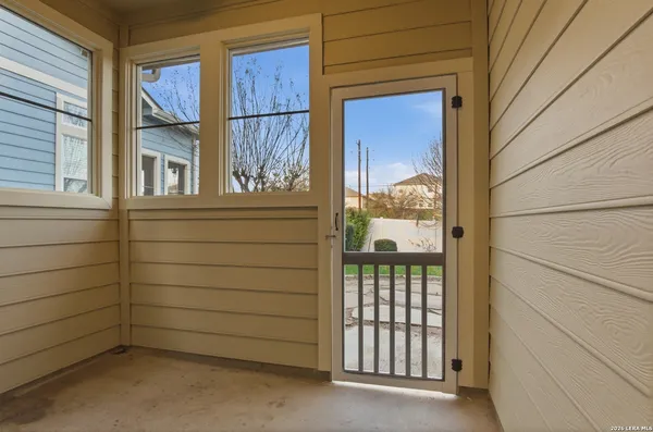a view of a blue door and a window