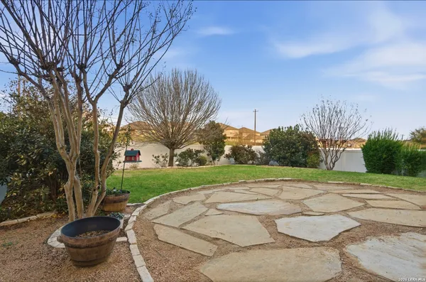a view of a backyard with green space