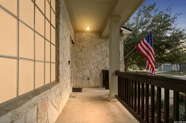 a view of balcony and wooden floor