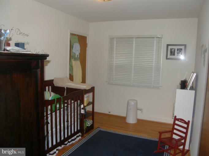 3306 Russell Road Alexandria, VA 22305 - Photo 13 of 21 a bedroom with furniture and a window